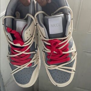 Gray and Cream Sneakers with Red Laces